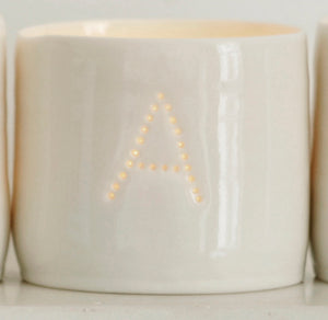 Ceramic candle holder with the letter A. Personalisable porcelain tealight holder.