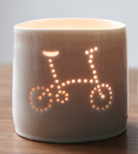 Porcelain ceramic tealight candle holder votive, featuring a design of a folding bike. Natural glossy glaze. Bicycle. Cycling gift. Brompton inspired.