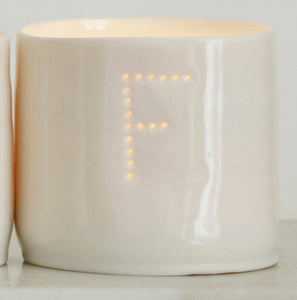 Ceramic candle holder with the letter F. Personalised porcelain tealight holder.