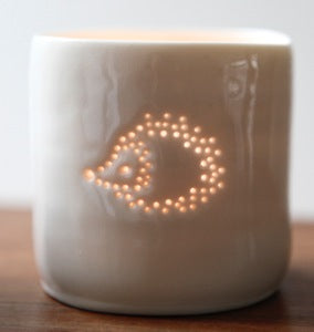 Cute hedgehog design candle holder. Porcelain ceramic tealight holder with adorable hedgehog design.